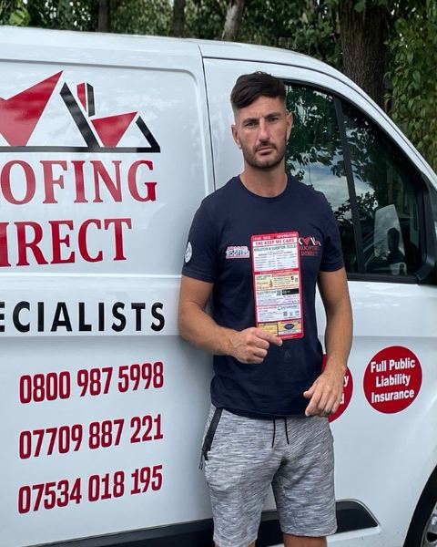 Joshua from Roofing Direct holding a Keep Me Card in front of his branded van